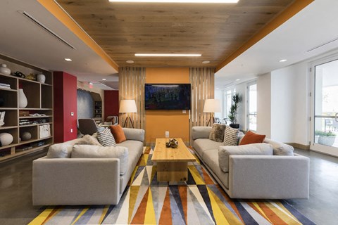 a living room with couches and a coffee table